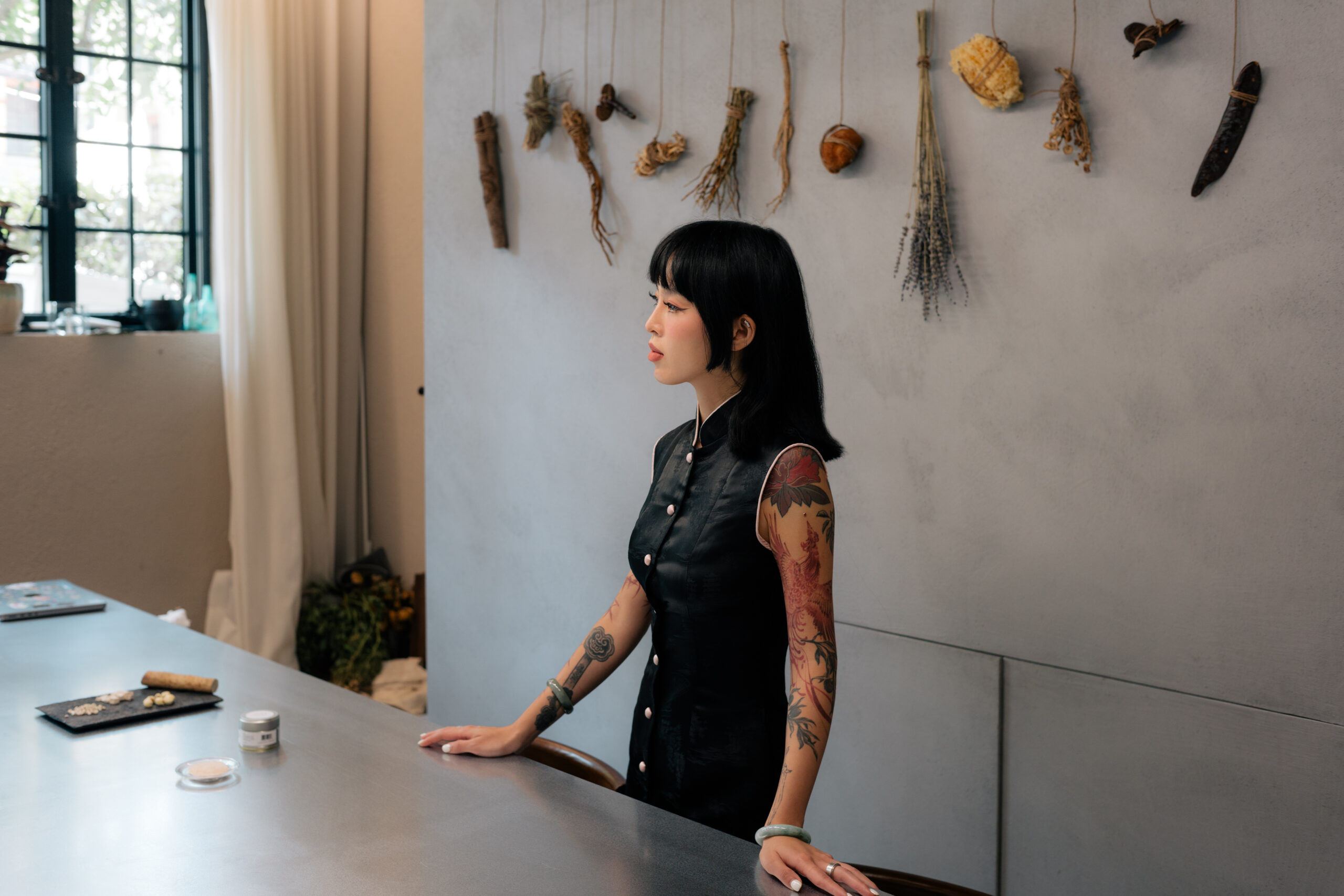 Portrait of Zoey Xinyi Gong, looking directly at the camera with dark hair framing her face.
